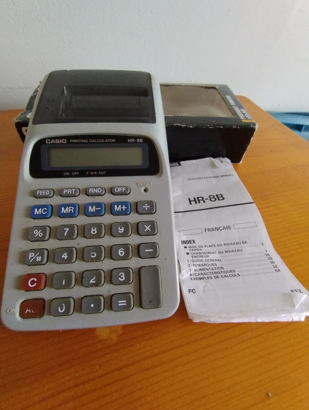 Casio HR-8B Printing Calculator in White, Gray, Blue, Red, and Black
